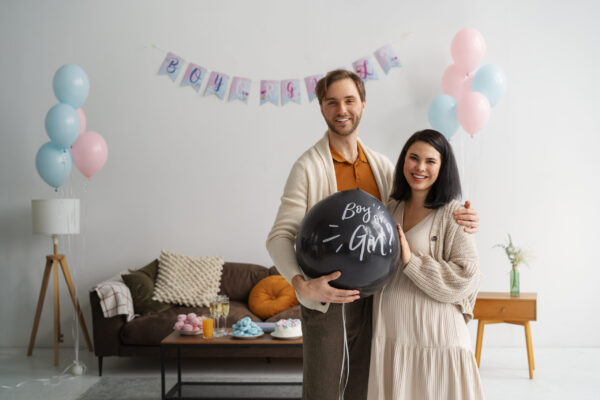 front-view-couple-at-gender-reveal-party (1)